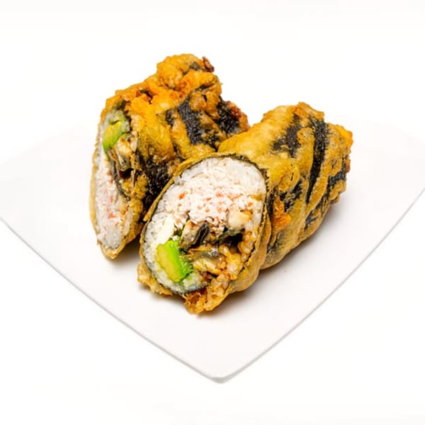 Two golden-fried sushi rolls with avocado and filling, on a white square plate.