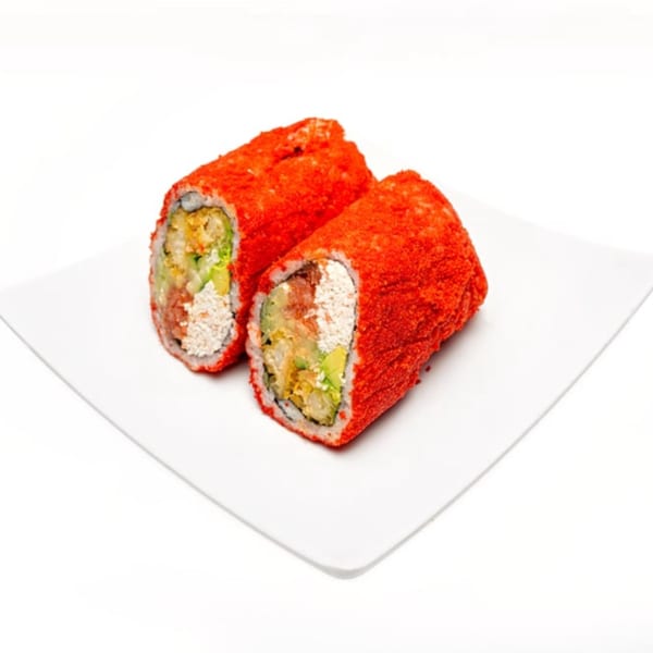 Two sushi burritos, coated in bright red tempura flakes, filled with fish, avocado, and rice.